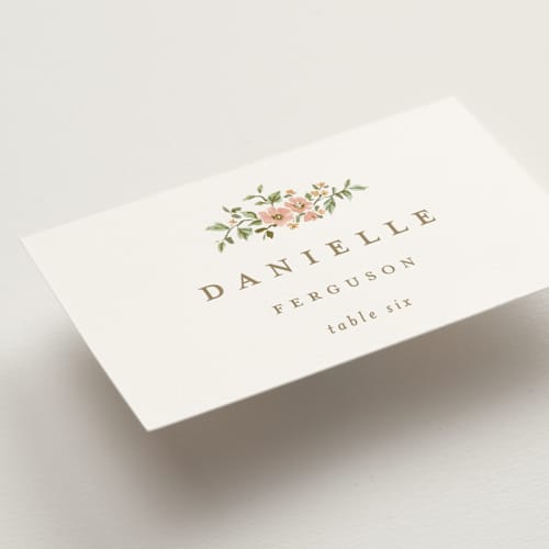 This is a blush wedding place cards with standard by Everett Paper Goods called foliage crest printing on signature in placecard
