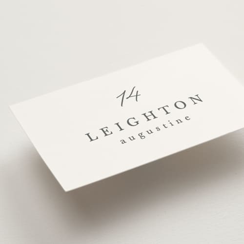 This is a pearl wedding place cards with standard by Hooray Creative called scripted names printing on signature in placecard