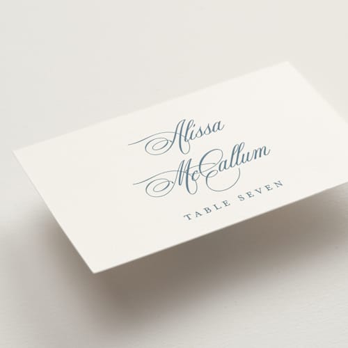 This is a dusty blue wedding place cards with standard by Jennifer Postorino called empire printing on signature in placecard