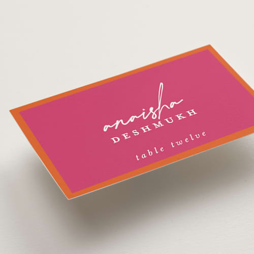 This is a fuchsia wedding place cards with standard by Pati Cascino called varna printing on signature in placecard