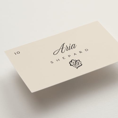 This is a coal wedding place cards with standard by Pixel and Hank called watercolor printing on signature in placecard