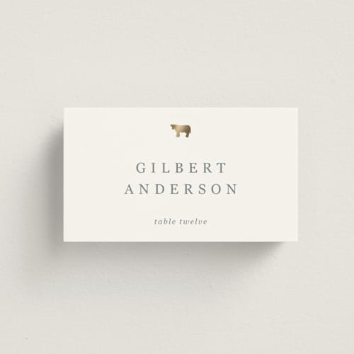 This is a ivory wedding place cards with foil pressed by Sierra Lee called noted printing on signature in placecard