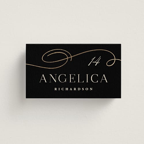 This is a onyx wedding place cards with foil pressed by Hooray Creative called black tie affair printing on signature in placecard