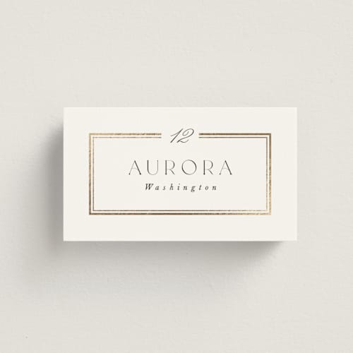 This is a pearl wedding place cards with foil pressed by Leah Bisch called elegant type printing on signature in placecard