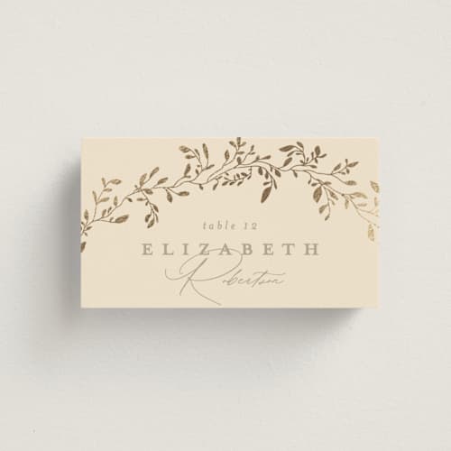 This is a sand wedding place cards with foil pressed by Creo Study called leafy garland printing on signature in placecard