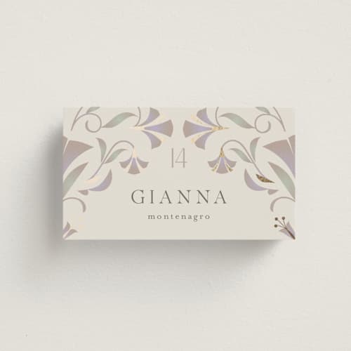 This is a vanilla wedding place cards with foil pressed by lori jacobs wemple called deco nouveau printing on signature in placecard