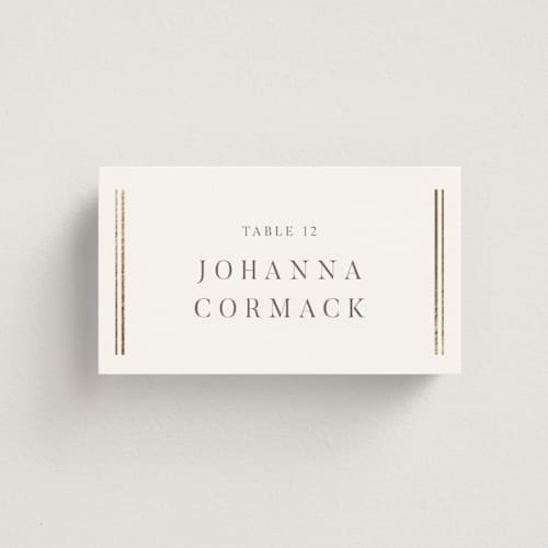 This is a pearl wedding place cards with foil pressed by Nicole Walsh called classic elegance printing on signature in placecard