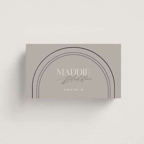 This is a truffle wedding place cards with foil pressed by Vera Lim called the arc printing on signature in placecard