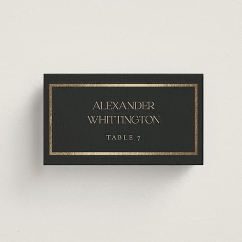This is a charcoal wedding place cards with foil pressed by Lucrecia Caporale called timeless charm printing on signature in placecard