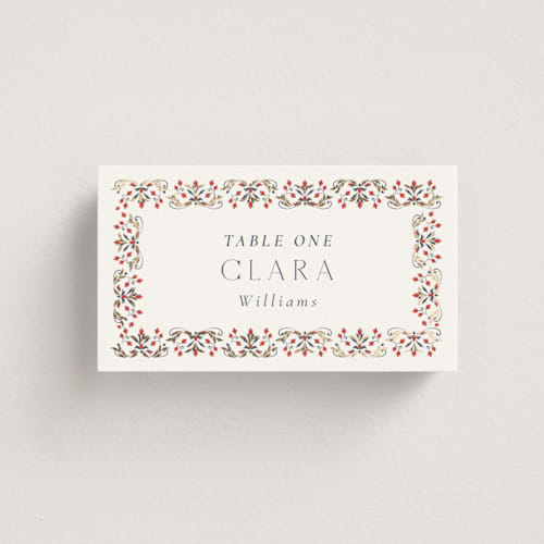 This is a scarlet wedding place cards with foil pressed by Sabrin Deirani called islamic arch printing on signature in placecard