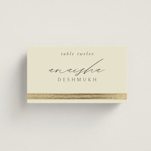This is a marigold wedding place cards with foil pressed by Pati Cascino called aatreya printing on signature in placecard