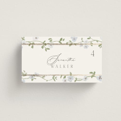 This is a blue bell wedding place cards with foil pressed by Everett Paper Goods called portico printing on signature in placecard