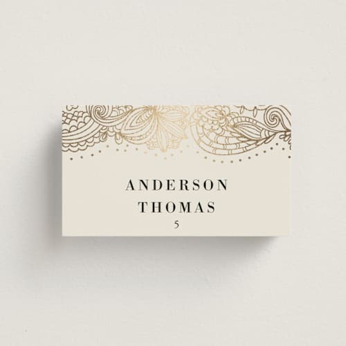 This is a champagne wedding place cards with foil pressed by Oma N. Ramkhelawan called elegant henna printing on signature in placecard