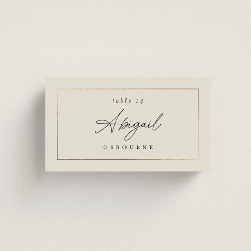This is a linen wedding place cards with foil pressed by Pippa Shaw called silk printing on signature in placecard