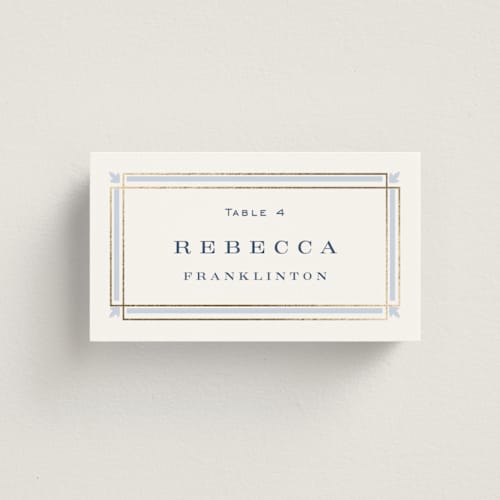This is a dusty blue wedding place cards with foil pressed by Janean Hinger called aurelia printing on signature in placecard