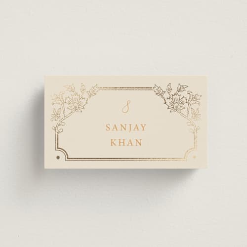 This is a ochre wedding place cards with foil pressed by Hannah Bowman called marigold printing on signature in placecard