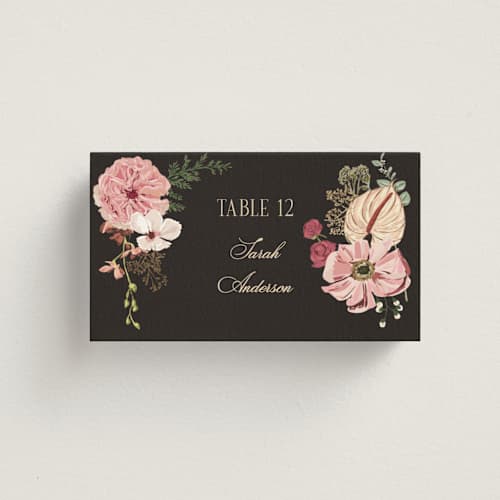 This is a blush wedding place cards with foil pressed by Susan Moyal called flouriishing printing on signature in placecard
