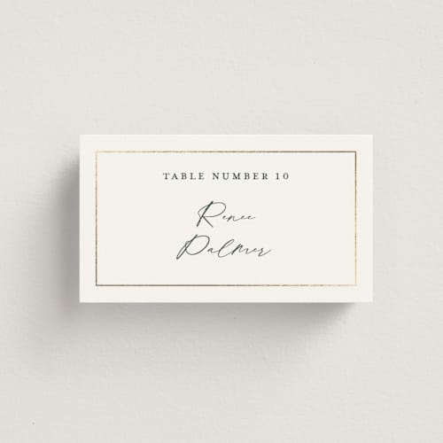 This is a forest wedding place cards with foil pressed by Stacey Meacham called elegant lillies printing on signature in placecard