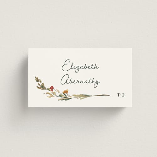 This is a garden green wedding place cards with foil pressed by Lucrecia Caporale called coastal bloom printing on signature in placecard