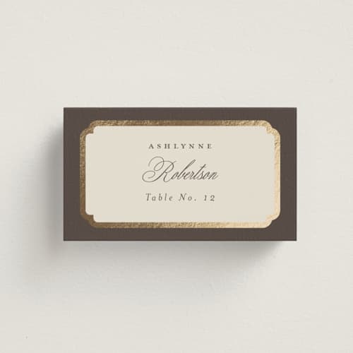 This is a cognac wedding place cards with foil pressed by Emily Betts called arch frame printing on signature in placecard