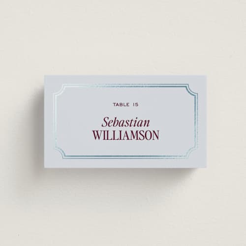 This is a celestial wedding place cards with foil pressed by Jenna Holcomb called modern vintage printing on signature in placecard