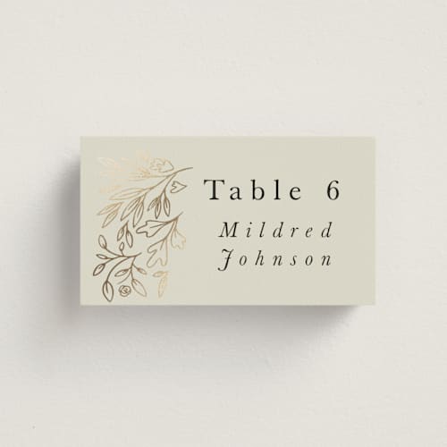 This is a taupe wedding place cards with foil pressed by Hannah Williams called foil botanical frame printing on signature in placecard