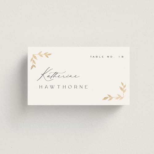 This is a lily wedding place cards with foil pressed by Owl and Toad called courtyard printing on signature in placecard