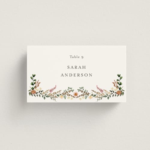 This is a blush wedding place cards with foil pressed by Susan Moyal called blooming vine printing on signature in placecard