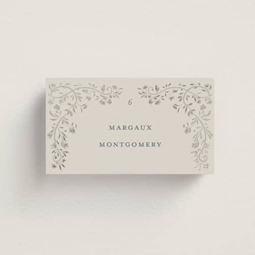 This is a something blue wedding place cards with foil pressed by Gwen Bedat called floral romance printing on signature in placecard