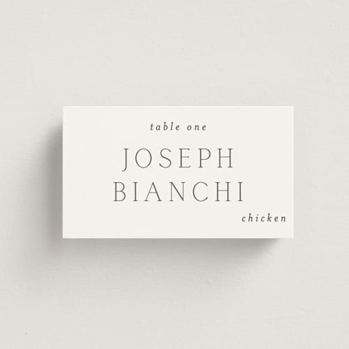 This is a cotton wedding place cards with standard by Vanessa Doyle called in love printing on signature in placecard