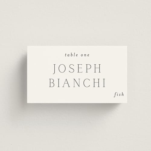 This is a cotton wedding place cards with standard by Vanessa Doyle called in love printing on signature in placecard