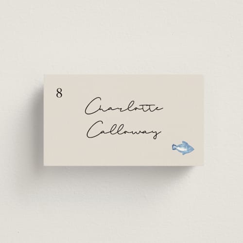 This is a champagne wedding place cards with standard by Lucrecia Caporale called handmade printing on signature in placecard