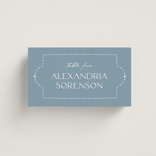 This is a delft blue wedding place cards with standard by Ashley DeMeyere called porcelain printing on signature in placecard
