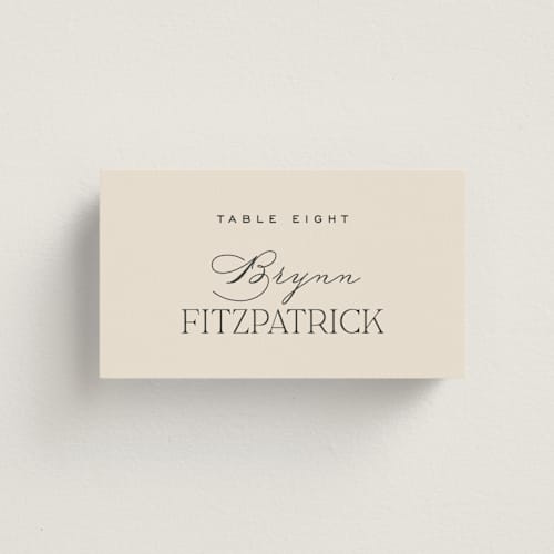 This is a creme wedding place cards with standard by Carly Reed Walker called tendu printing on signature in placecard