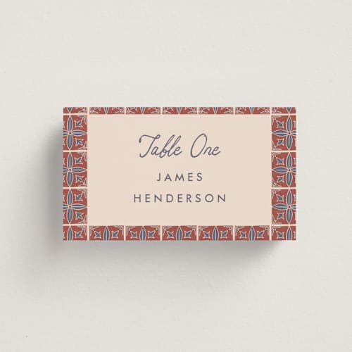 This is a terracotta wedding place cards with standard by Katharine Watson called block print tile printing on signature in placecard