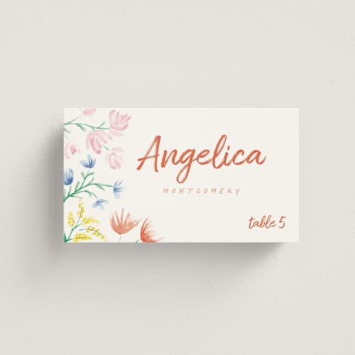 This is a peach wedding place cards with standard by Zani van Zyl called flora printing on signature in placecard