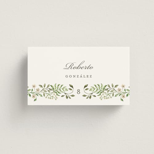 This is a sage wedding place cards with standard by Sarah Knight called greenery crest printing on signature in placecard