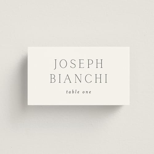 This is a cotton wedding place cards with standard by Vanessa Doyle called in love printing on signature in placecard