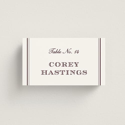 This is a burgundy wedding place cards with standard by Stacey Meacham called engraved names printing on signature in placecard
