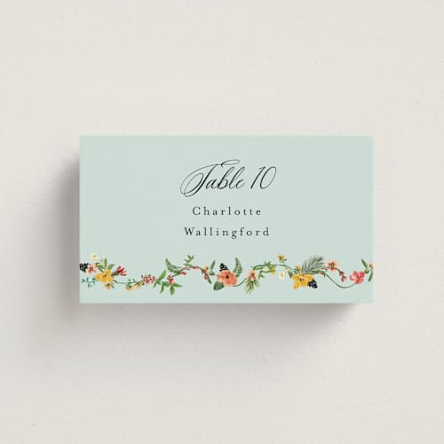 This is a papaya wedding place cards with standard by Susan Moyal called tropical crest printing on signature in placecard