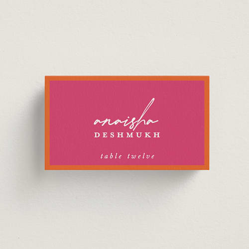 This is a fuchsia wedding place cards with standard by Pati Cascino called varna printing on signature in placecard