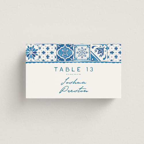 This is a navy wedding place cards with standard by Anastasia Makarova called watercolor tile printing on signature in placecard