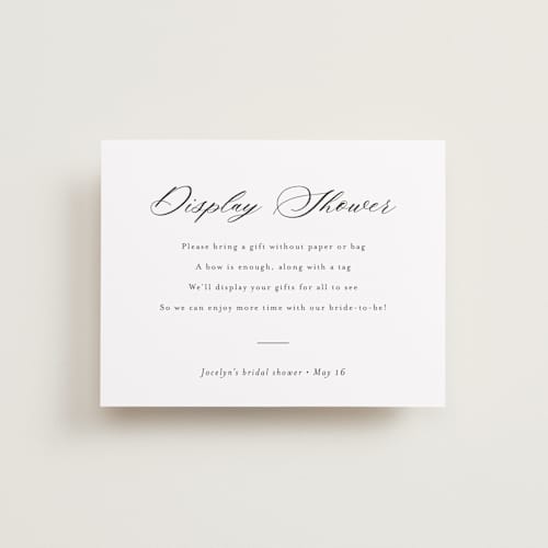 This is a snow bridal shower insert cards with standard by Minted called script display shower printing on signature in standard