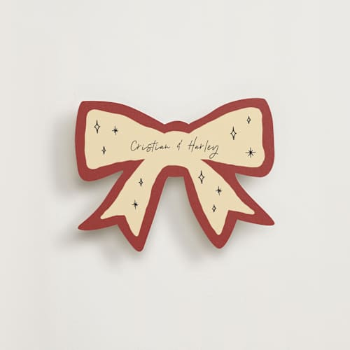 This is a velvet red insert cards with standard by Zove Ahhh called whimsical bow printing on signature in standard