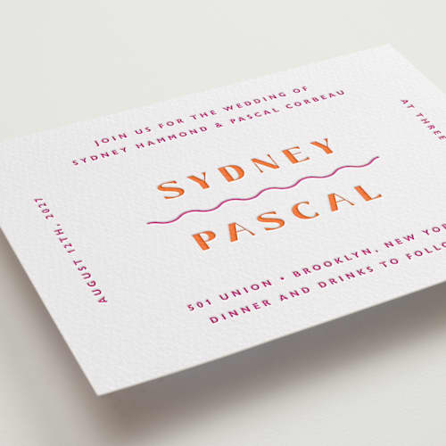 This is a flamingo letterpress wedding invitations with letterpress by Olivia Raufman called tanti baci printing on white cotton in standard