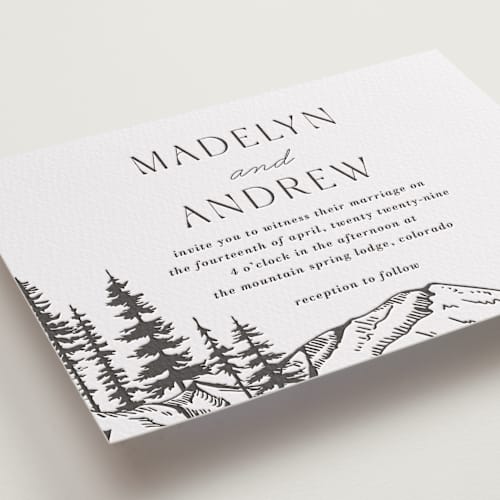 This is a soft black letterpress wedding invitations with letterpress by Winston Latchman called mountain pines printing on white cotton in standard