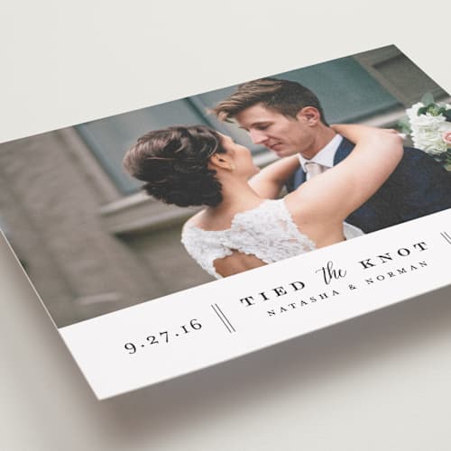 This is a vanilla wedding announcements with standard by Jennifer Wick called bottom line printing on recycled smooth signature in standard