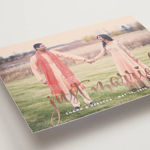 This is a rose gold wedding announcements with foil pressed by Annie Clark called aglow printing on recycled smooth signature in standard