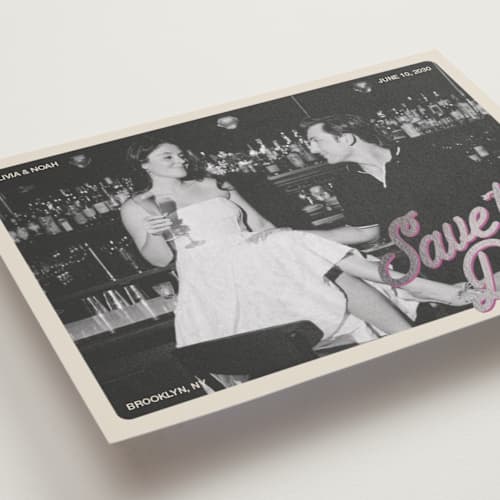 This is a plum foil stamped save the date cards with foil pressed by Inkblot Design called bartop printing on recycled smooth signature in standard