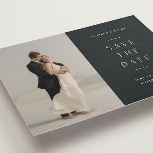 This is a charcoal foil stamped save the date cards with foil pressed by Stacey Meacham called subtle elegance printing on recycled smooth signature in standard